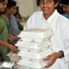 Children engaged in arranging the Prasad